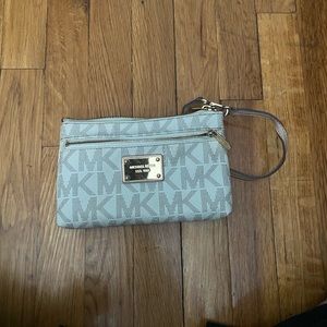 Michael Kors cream-colored wristlet